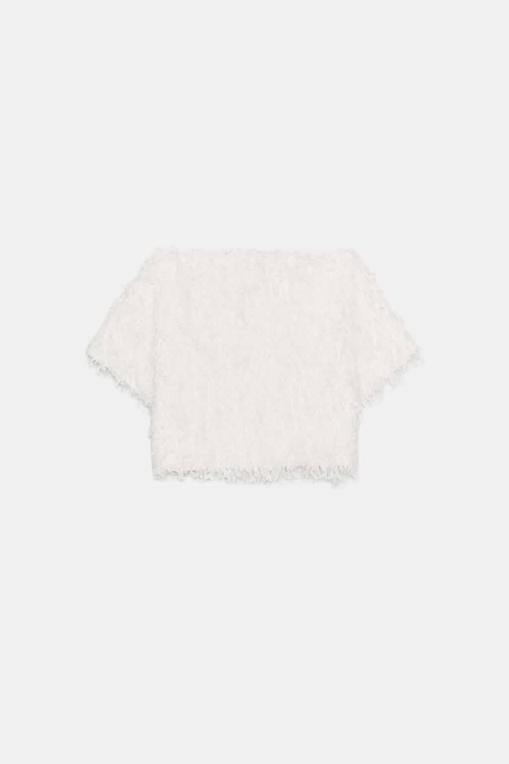 ТРИКОТАЖНЫЙ ТОП С БАХРОМОЙ