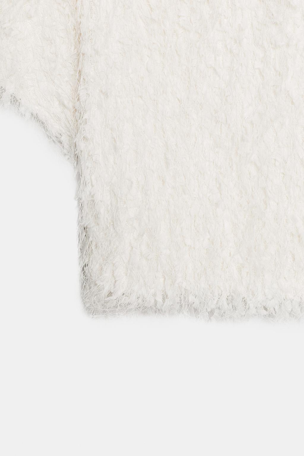 ТРИКОТАЖНЫЙ ТОП С БАХРОМОЙ