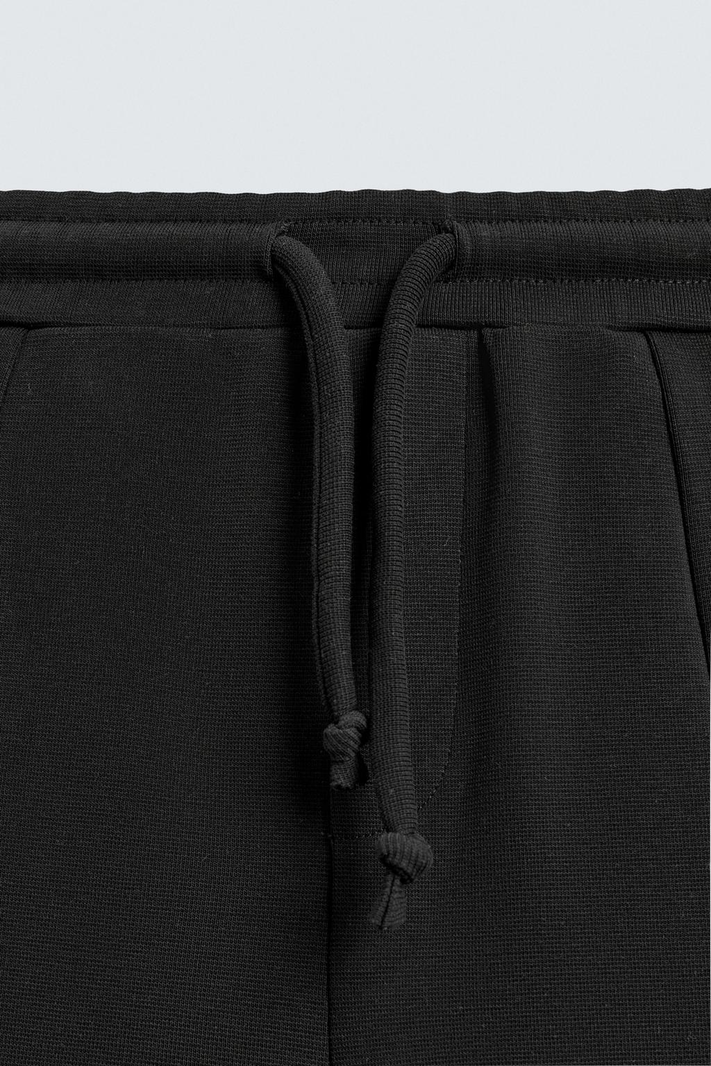 ДЖОГГЕРЫ RELAXED FIT С ДЕКОРАТИВНЫМИ ШВАМИ