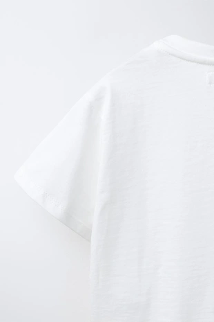 Футболка с органзовыми цветами- Заказать в России