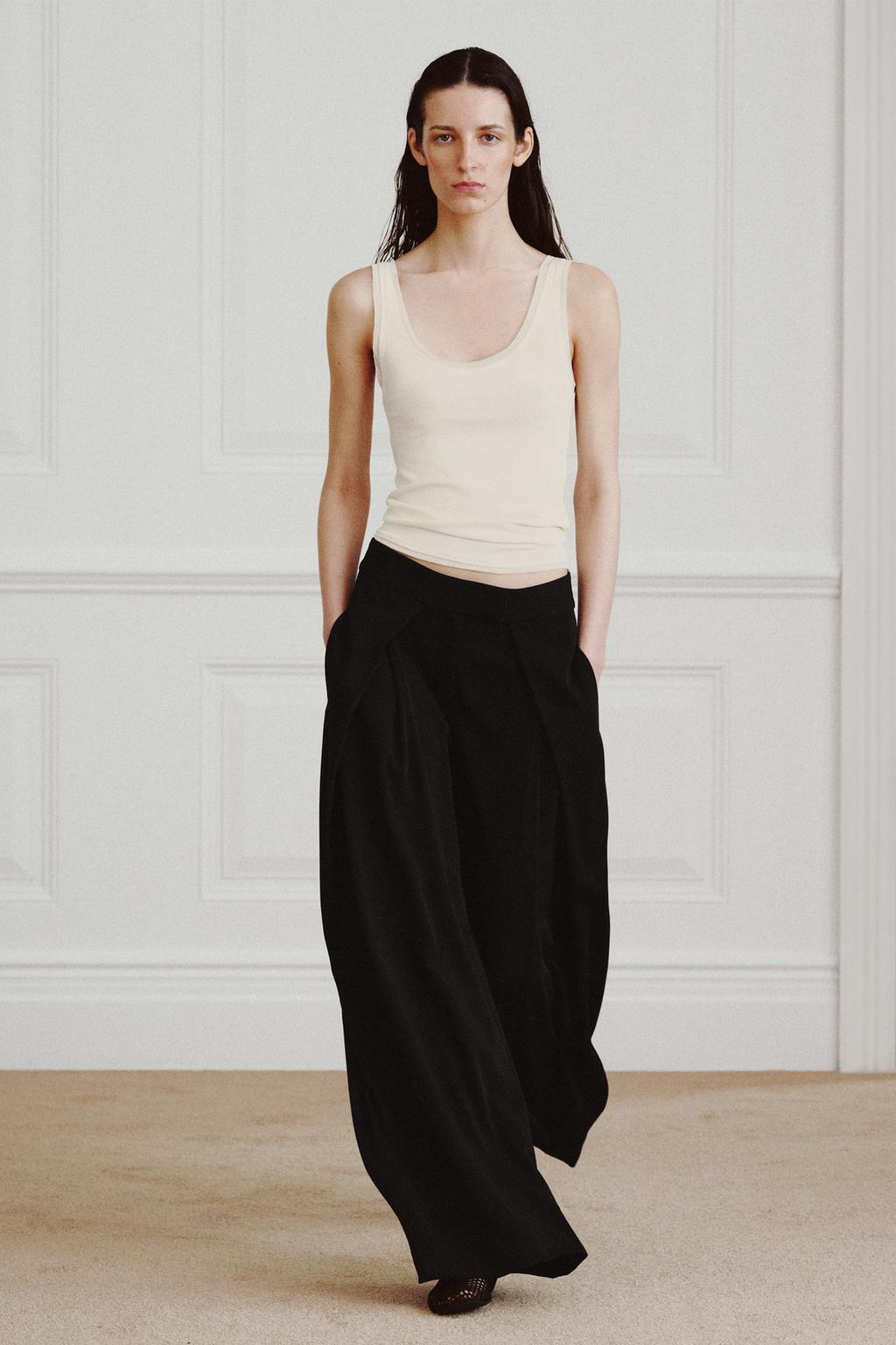 ФУТБОЛКА В РУБЧИК С БРЕТЕЛЯМИ