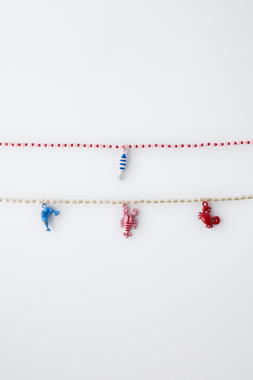 НАБОР ИЗ ДВУХ ОЖЕРЕЛИЙ С БУСИНАМИ И МОРСКИМИ ЭЛЕМЕНТАМИ