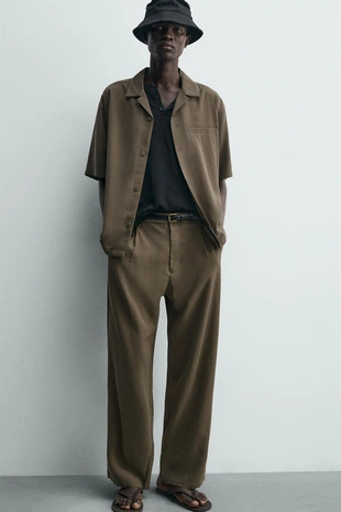 Струящиеся брюки Relaxed Fit- Заказать в России