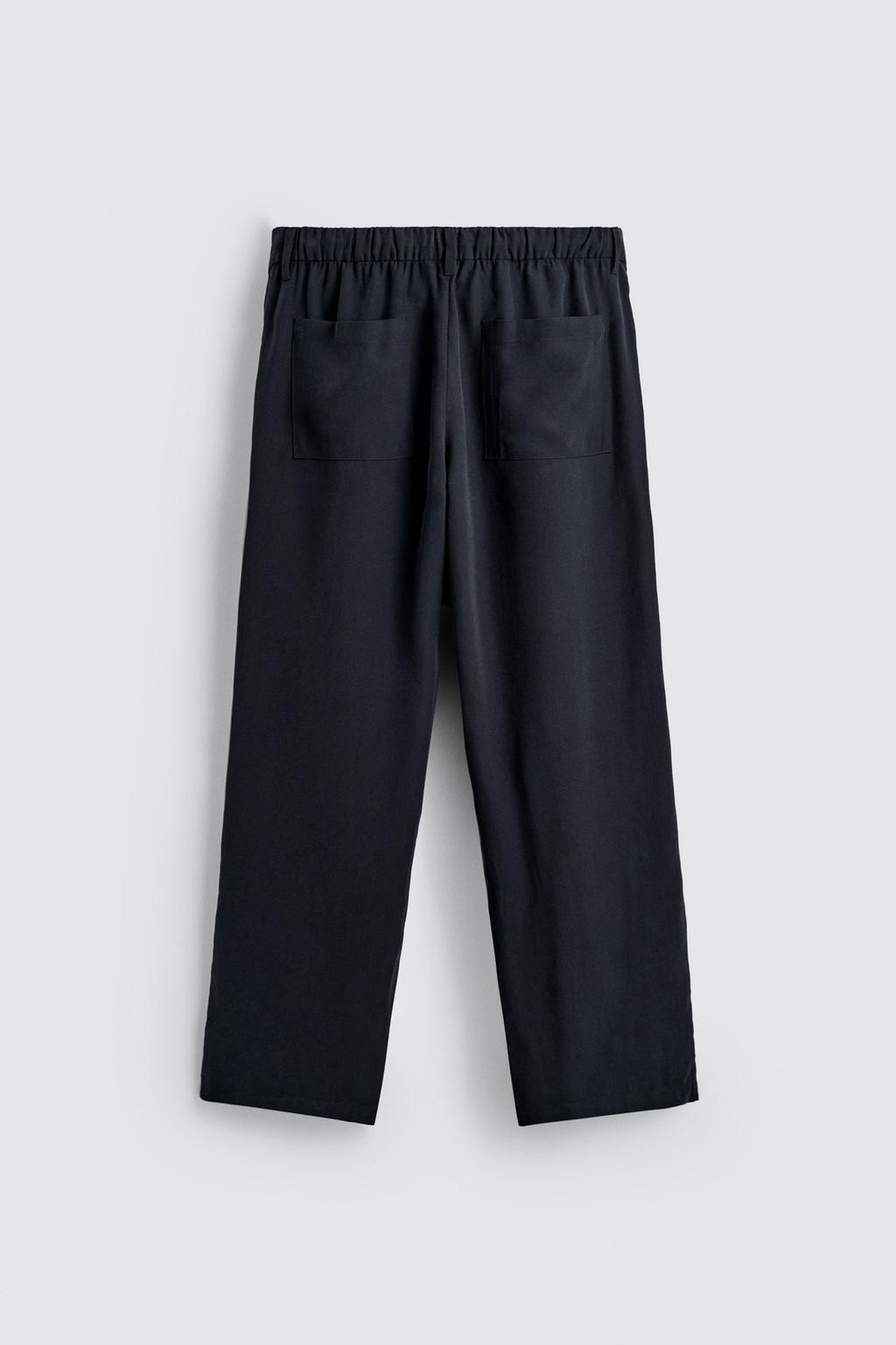 БРЮКИ RELAXED FIT ИЗ СТРУЯЩЕЙСЯ ТКАНИ