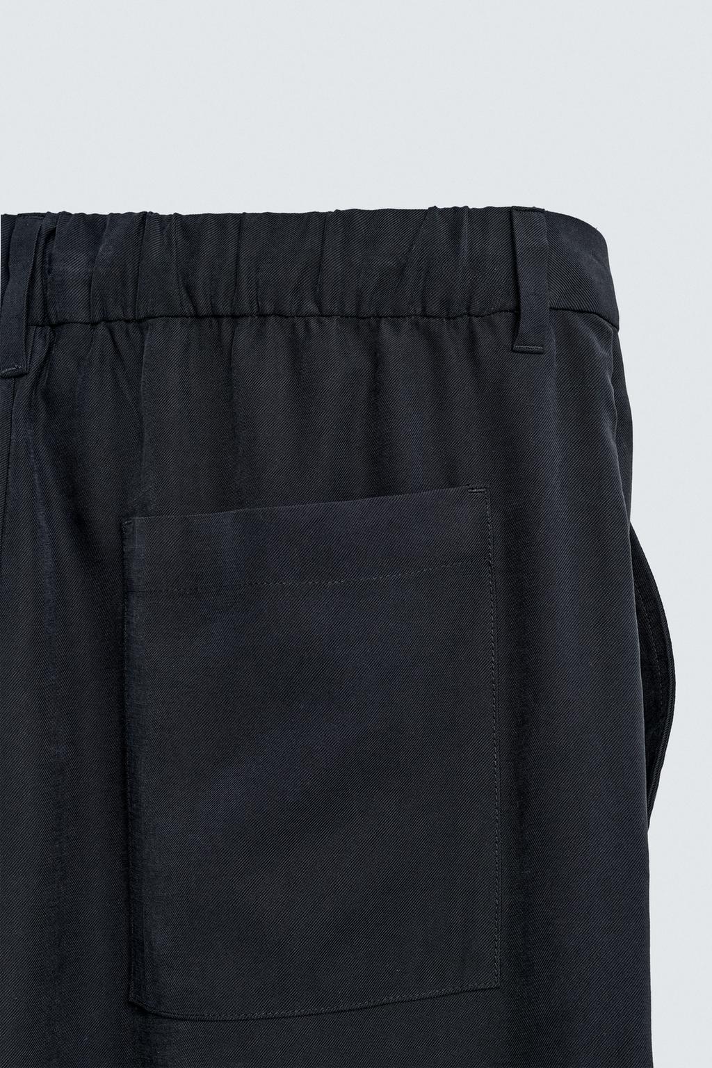 БРЮКИ RELAXED FIT ИЗ СТРУЯЩЕЙСЯ ТКАНИ