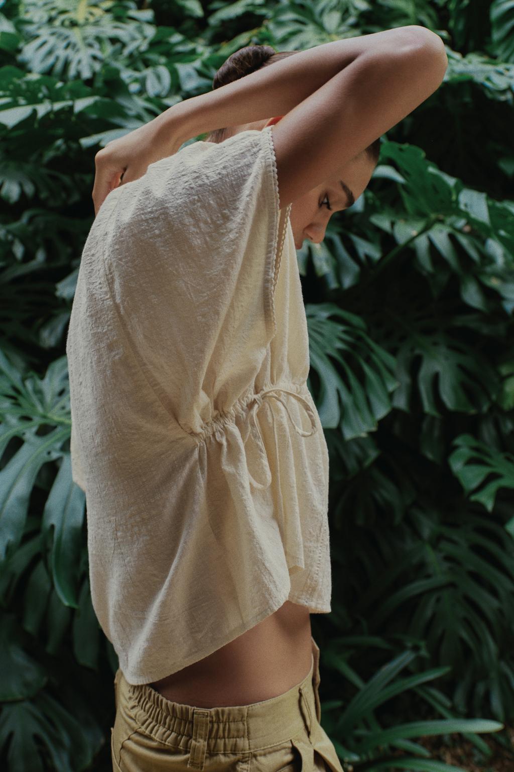 ТОП С ВЫШИВКОЙ И БОКОВЫМИ ШНУРОВКАМИ