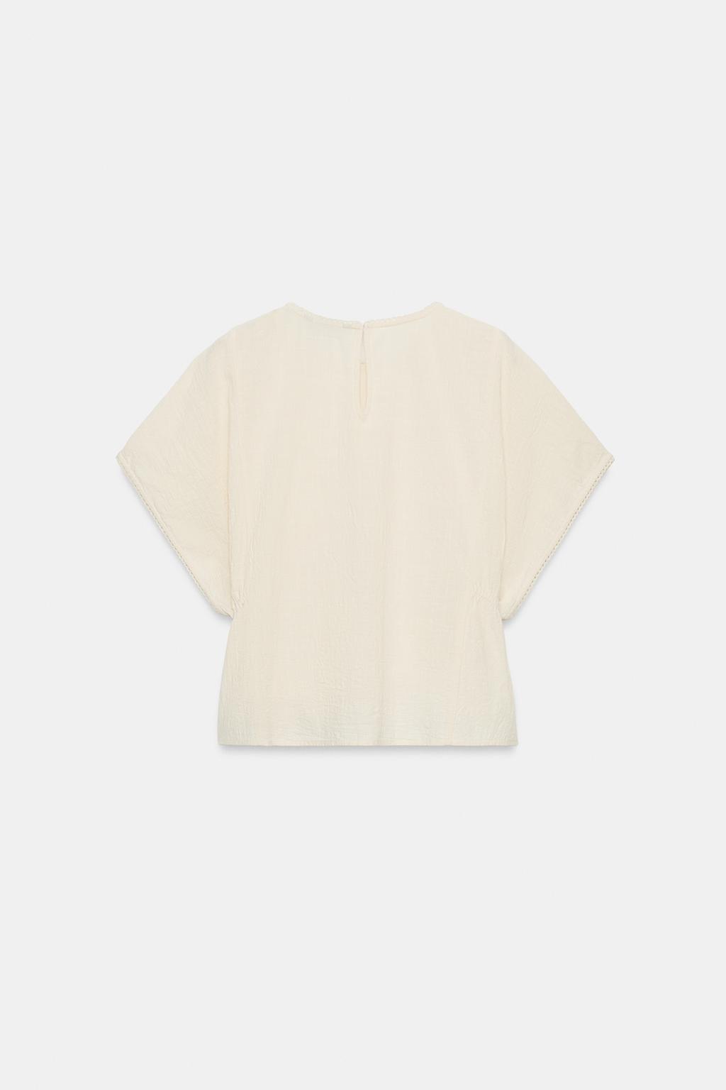 ТОП С ВЫШИВКОЙ И БОКОВЫМИ ШНУРОВКАМИ