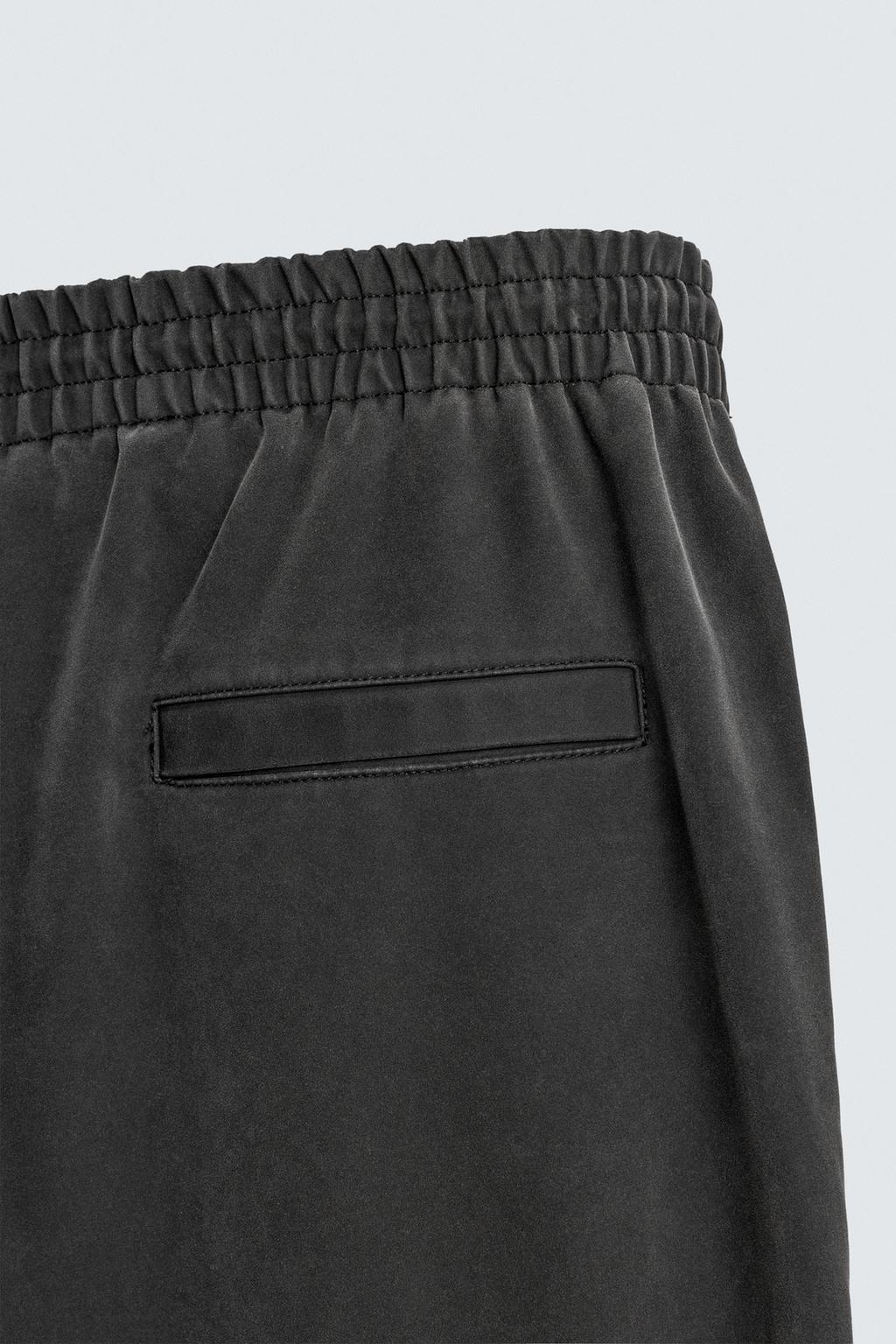 БРЮКИ RELAXED FIT ИЗ ИСКУССТВЕННОЙ КОЖИ С ЗАКЛЕПКАМИ