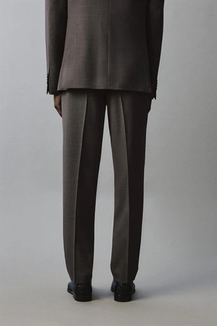 Костюмные брюки из рельефной ткани- Заказать в России