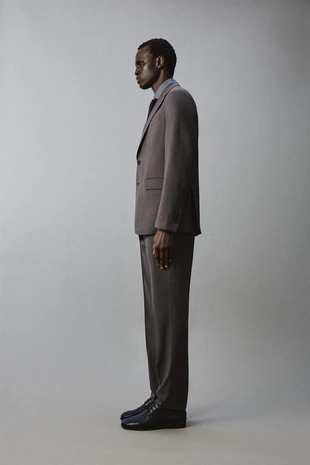 Костюмные брюки из рельефной ткани- Заказать в России