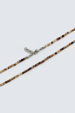 Ожерелье из каменных бусин- Заказать в России