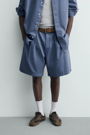 Шорты с эффектом потертости и складками- Заказать в России