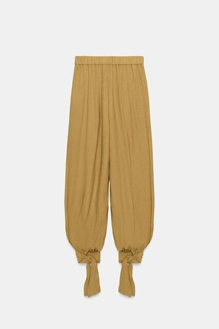 Брюки-багги с бантами- Заказать в России