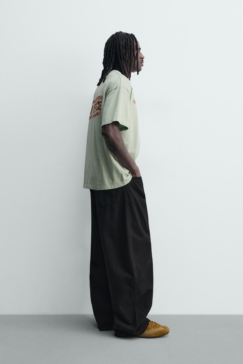 ФУТБОЛКА ИЗ ТКАНИ С ЭФФЕКТОМ ПОТЕРТОСТИ С НАДПИСЬЮ