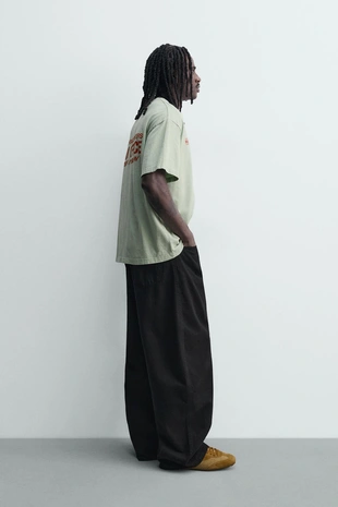 Футболка из ткани с эффектом потертости с надписью- Заказать в России