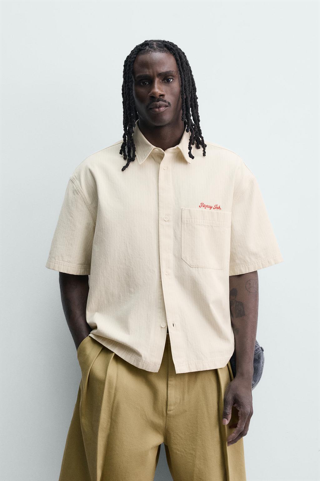 РУБАШКА В КЛЕТКУ С ВЫШИТОЙ НАДПИСЬЮ