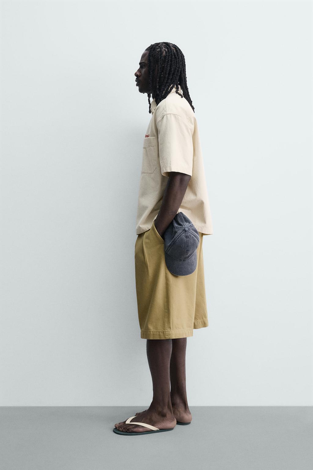 РУБАШКА В КЛЕТКУ С ВЫШИТОЙ НАДПИСЬЮ