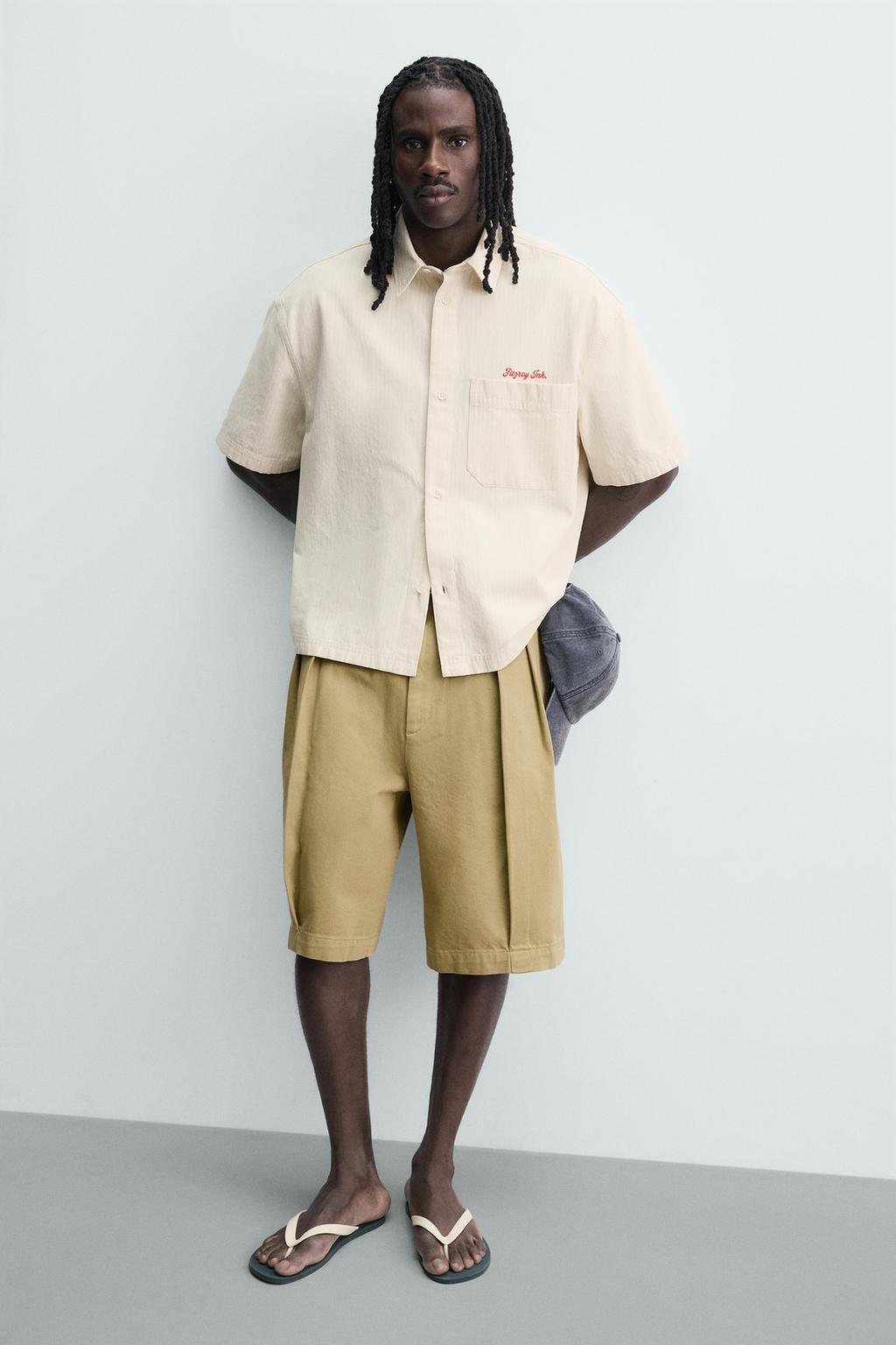 РУБАШКА В КЛЕТКУ С ВЫШИТОЙ НАДПИСЬЮ