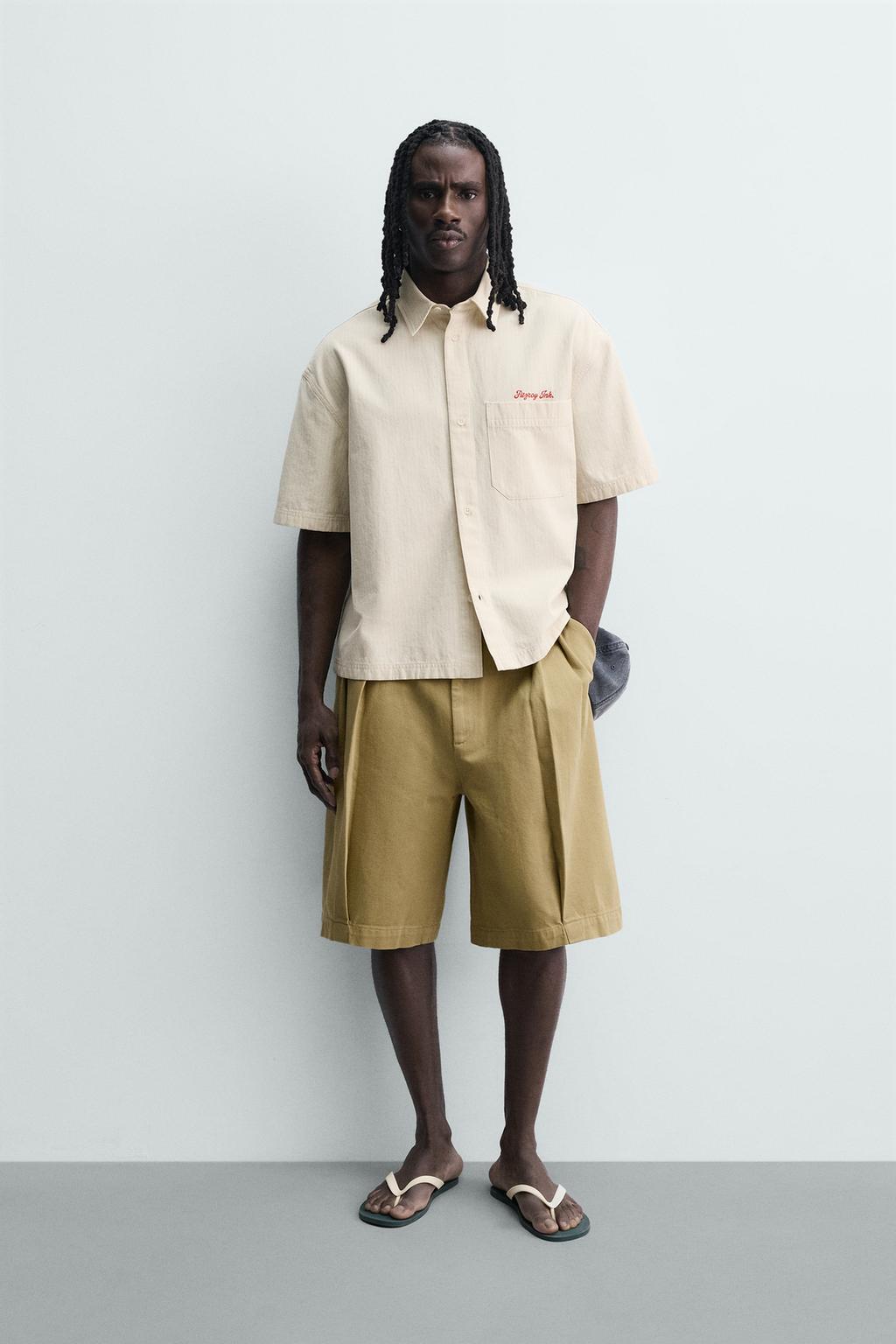 РУБАШКА В КЛЕТКУ С ВЫШИТОЙ НАДПИСЬЮ