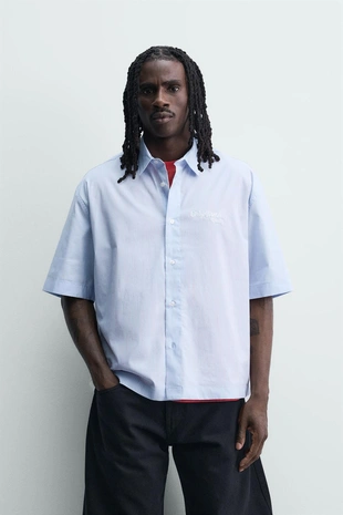 Рубашка в полоску с комбинированным принтом