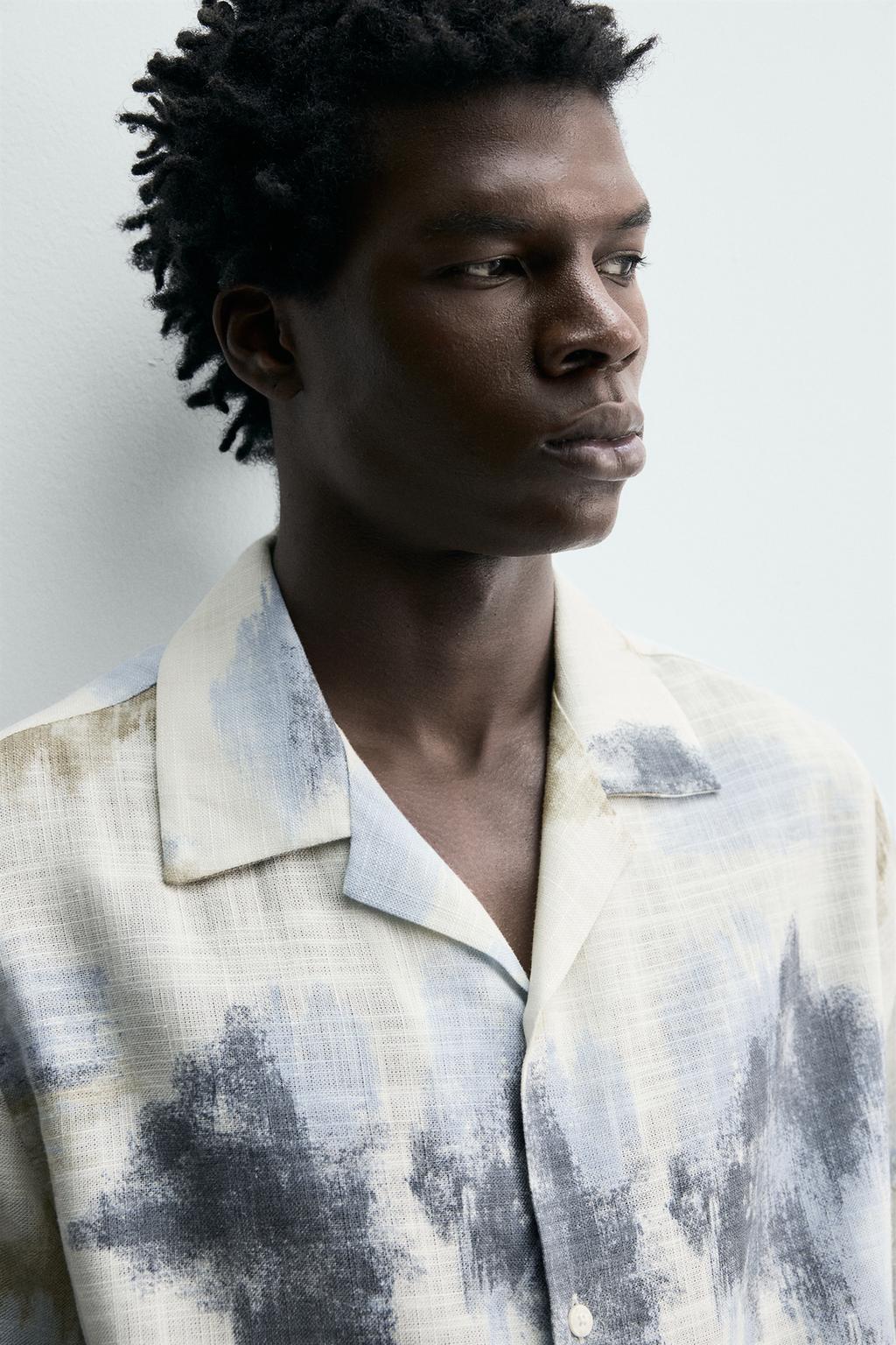 РУБАШКА СТРУЯЩЕГОСЯ ПОКРОЯ С АБСТРАКТНЫМ ПРИНТОМ