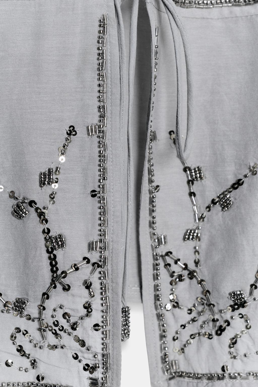 ТОП НА БРЕТЕЛЯХ С БАНТАМИ И БУСИНАМИ