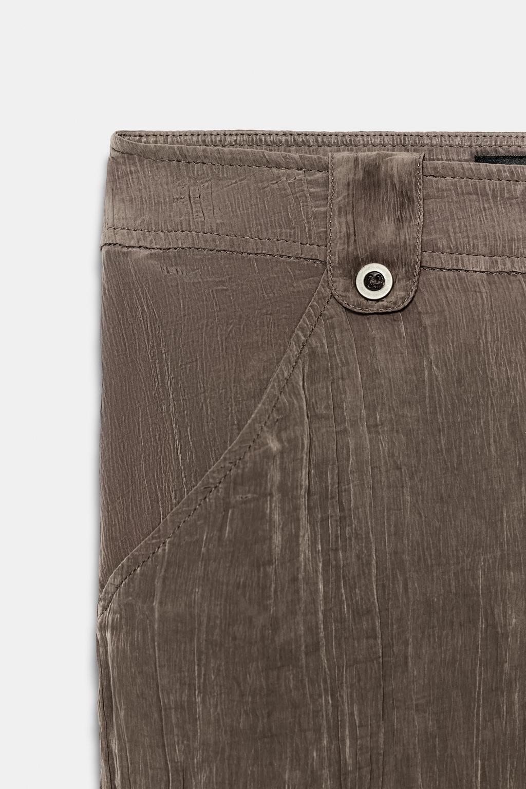 СТРУЯЩИЕСЯ БРЮКИ С МЯТЫМ ЭФФЕКТОМ