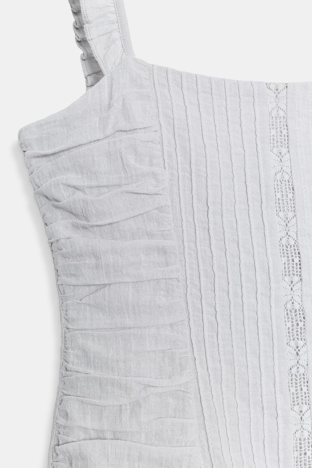 КОРОТКОЕ ПЛАТЬЕ С ОБЪЕМНОЙ ВЫШИВКОЙ