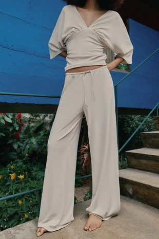 Брюки палаццо из фактурной ткани- Заказать в России