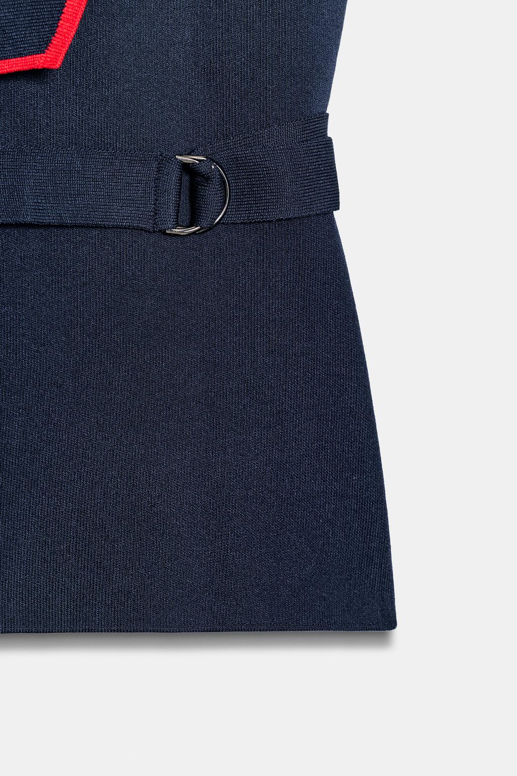 ДВУБОРТНЫЙ ЖИЛЕТ С ПРЯЖКАМИ