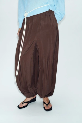 Широкие брюки с эластичным поясом- Заказать в России