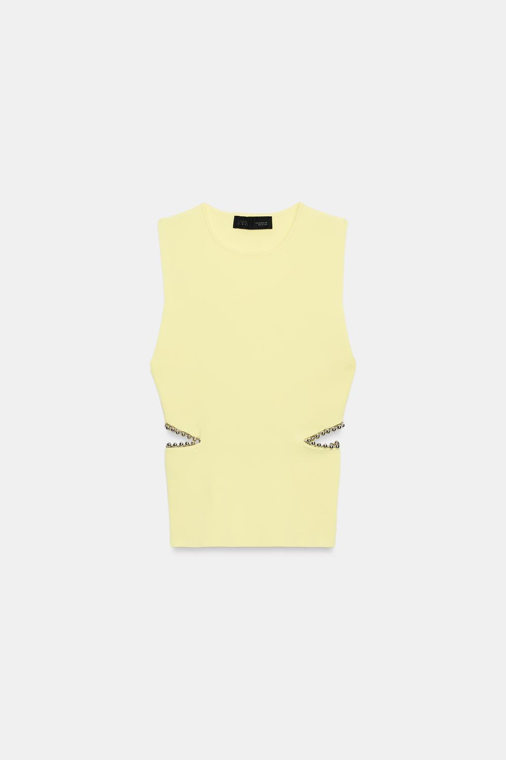 ТРИКОТАЖНЫЙ ТОП С ВЫРЕЗАМИ И БУСИНАМИ