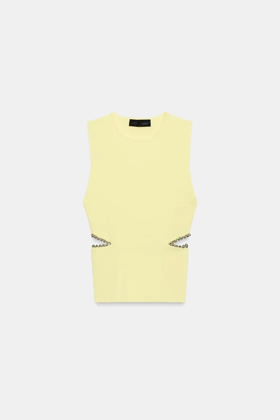 ТРИКОТАЖНЫЙ ТОП С ВЫРЕЗАМИ И БУСИНАМИ