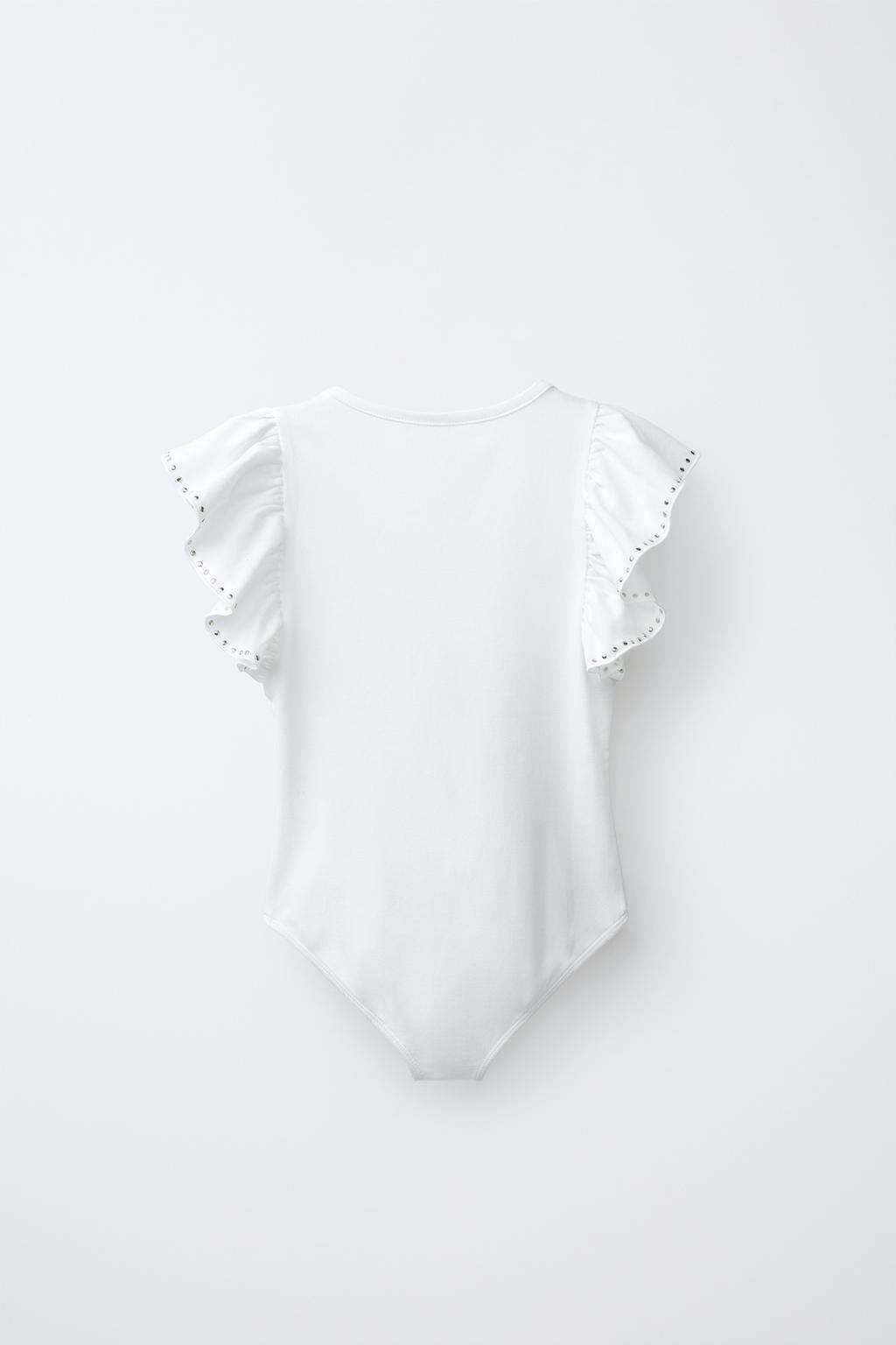 БОДИ С ВОЛАНОМ И ЗАКЛЕПКАМИ ИЗ МОДАЛА