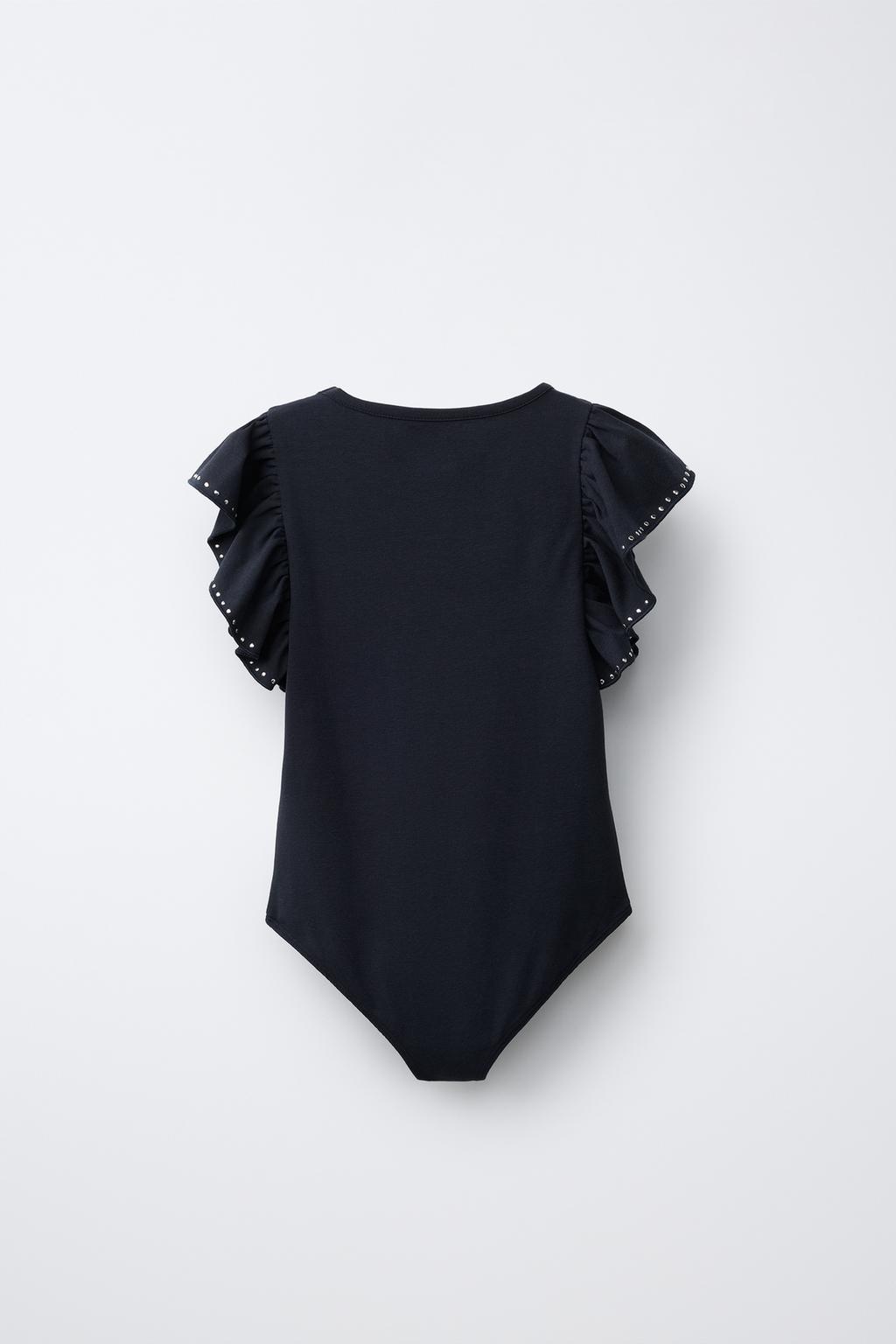 БОДИ С ВОЛАНОМ И ЗАКЛЕПКАМИ ИЗ МОДАЛА