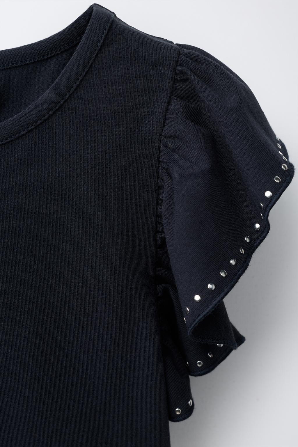 БОДИ С ВОЛАНОМ И ЗАКЛЕПКАМИ ИЗ МОДАЛА