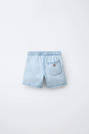 Джинсовые шорты с этикеткой- Заказать в России