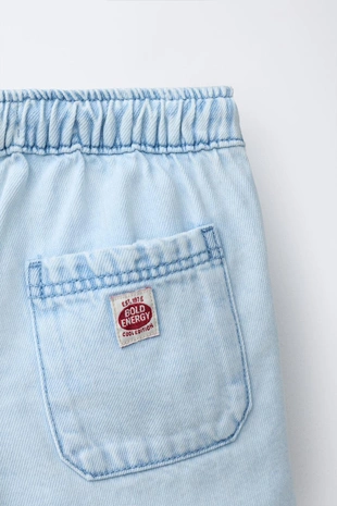 Джинсовые шорты с этикеткой- Заказать в России