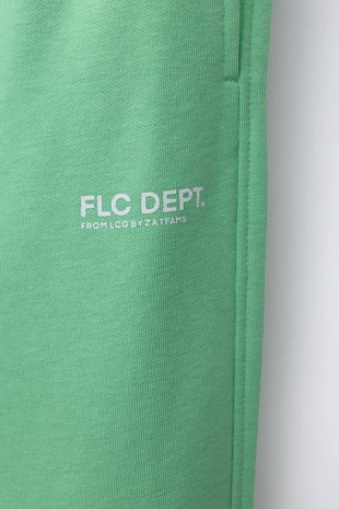 Брюки-джоггеры с надписью