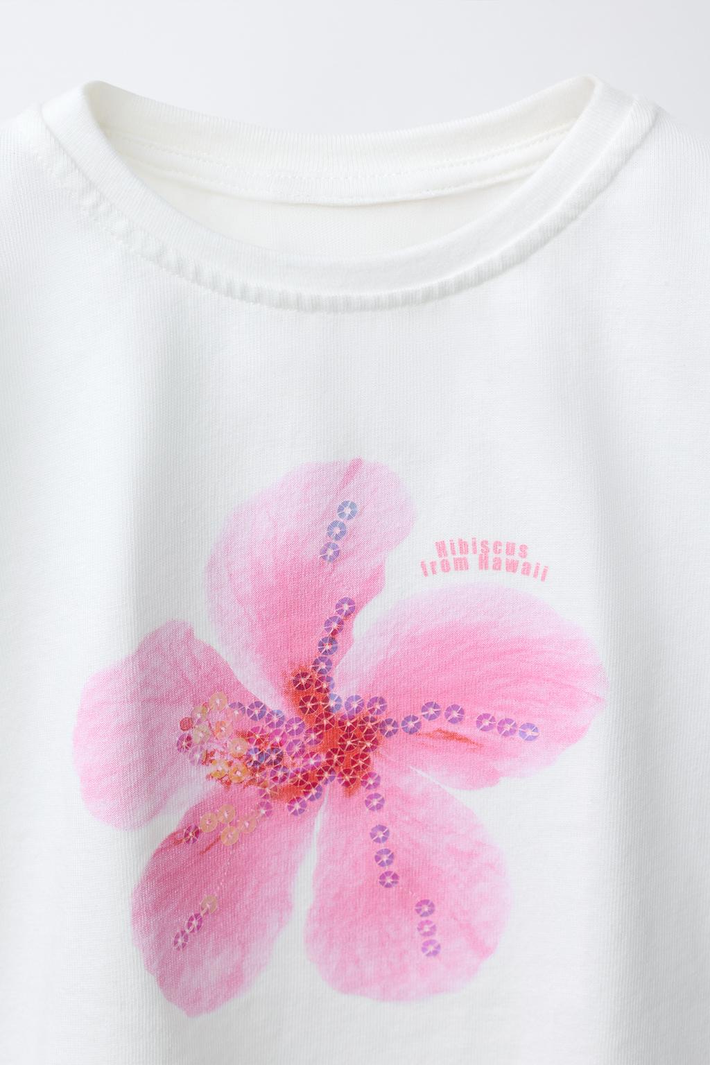 ФУТБОЛКА С ЦВЕТКОМ И ПАЙЕТКАМИ