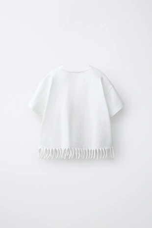 Футболка с цветком и пайетками- Заказать в России