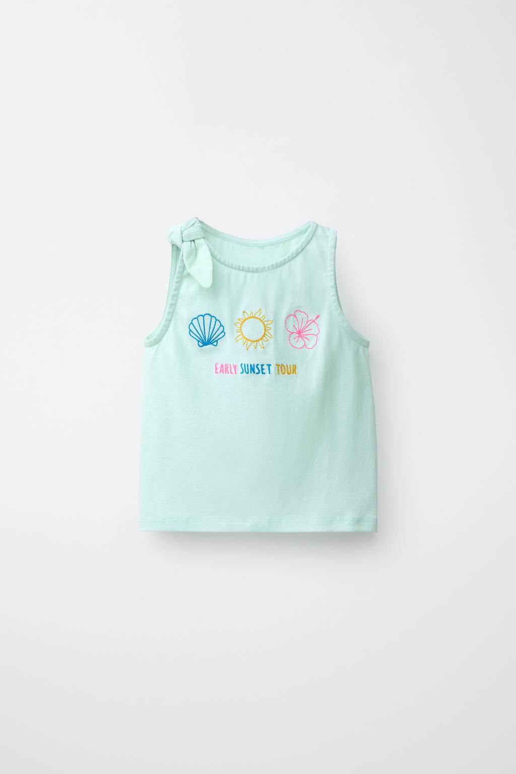 ФУТБОЛКА С УЗЛОМ И ТРОПИЧЕСКОЙ ВЫШИВКОЙ