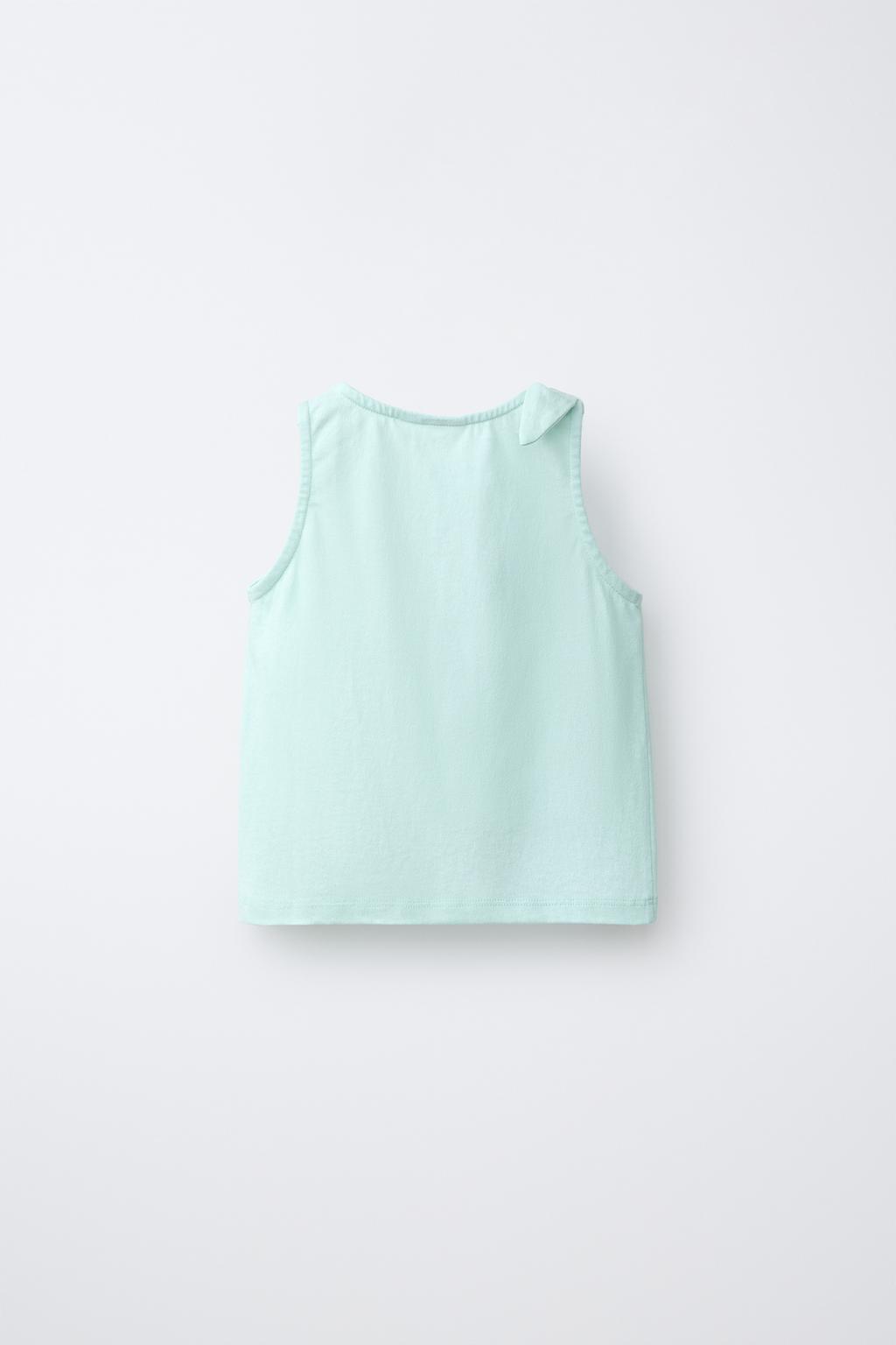 ФУТБОЛКА С УЗЛОМ И ТРОПИЧЕСКОЙ ВЫШИВКОЙ