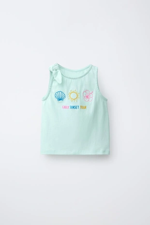 Футболка с узлом и тропической вышивкой- Заказать в России