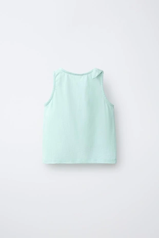 Футболка с узлом и тропической вышивкой- Заказать в России