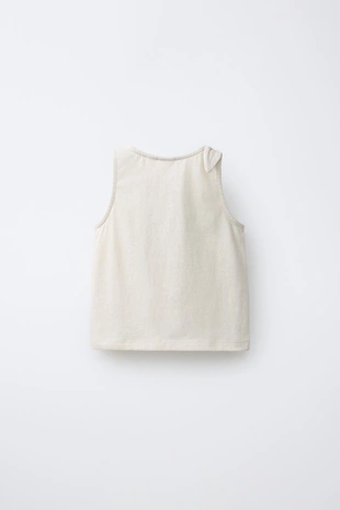 Футболка с узлом и тропической вышивкой- Заказать в России