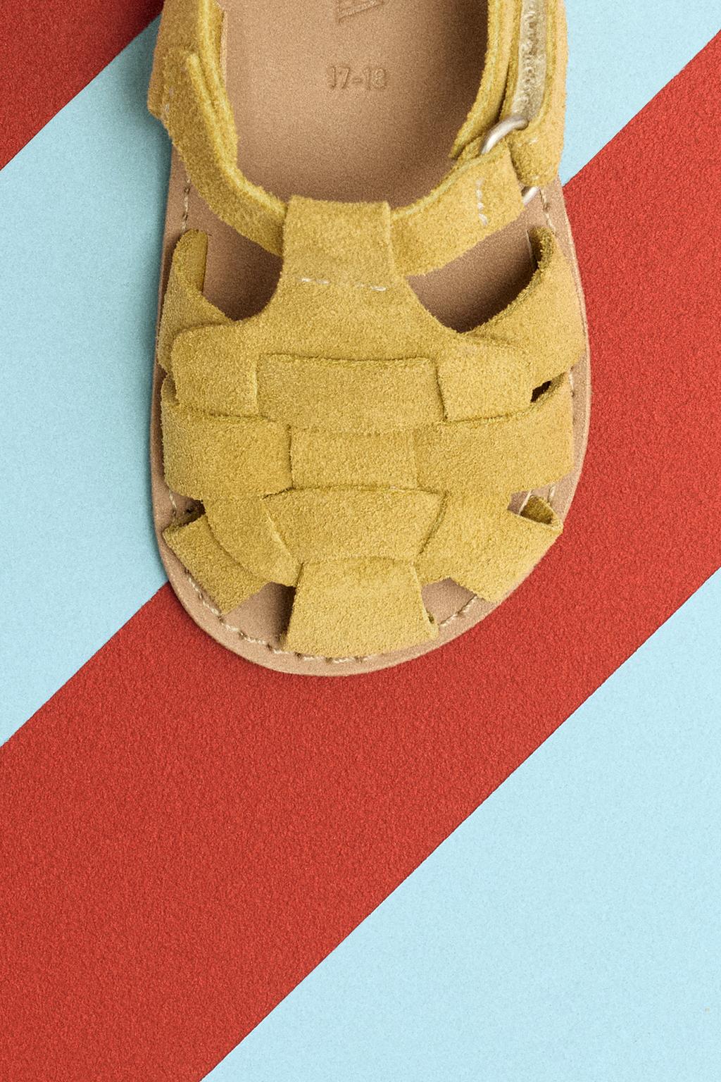 Сандалии в кожаной клетке