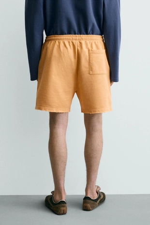 Шорты-джоггеры Relaxed Fit с эффектом потертости- Заказать в России