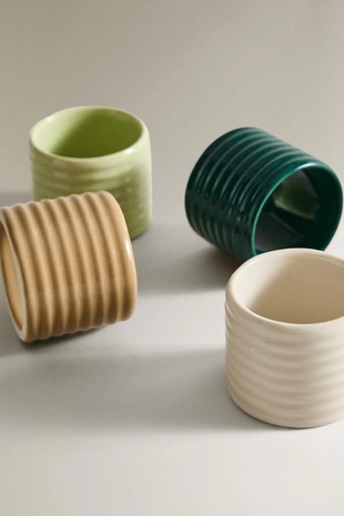 Набор керамических колец для салфеток с рельефным дизайном (набор из 4)- Заказать в России