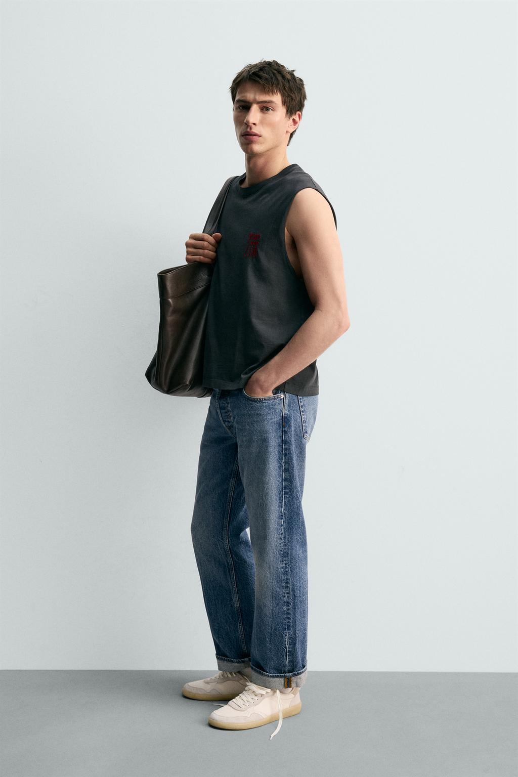 Футболка-майка свободного кроя Jurassic Park © UCS LLC and Amblin